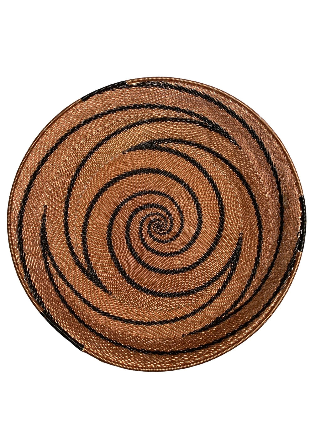 Handmade in South Africa, in brown and black, showcasing local artistry with its round shape and swirling pattern from center to edge.